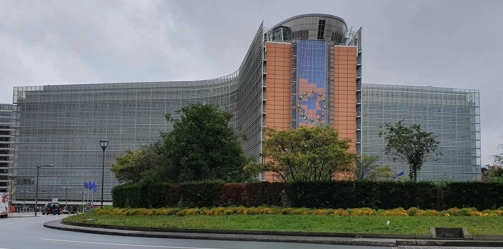 The European Commission’s Berlaymont building in Brussels, with European flags outside